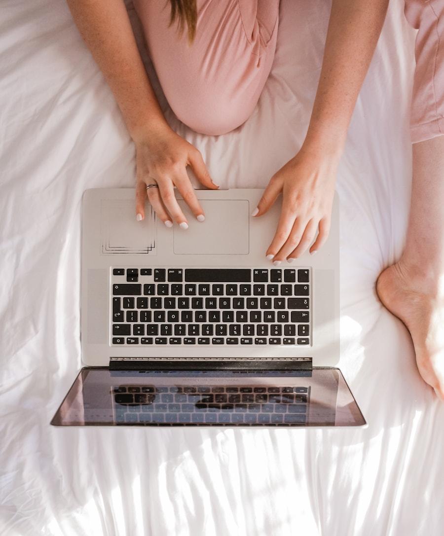 Hands sketching wireframes and UI flows on paper